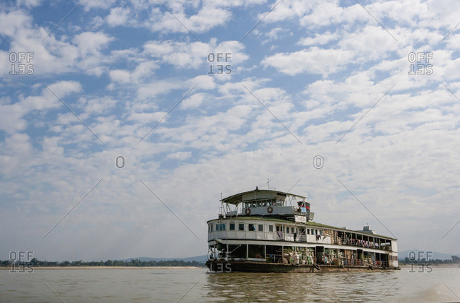 Ferry floating in remote river