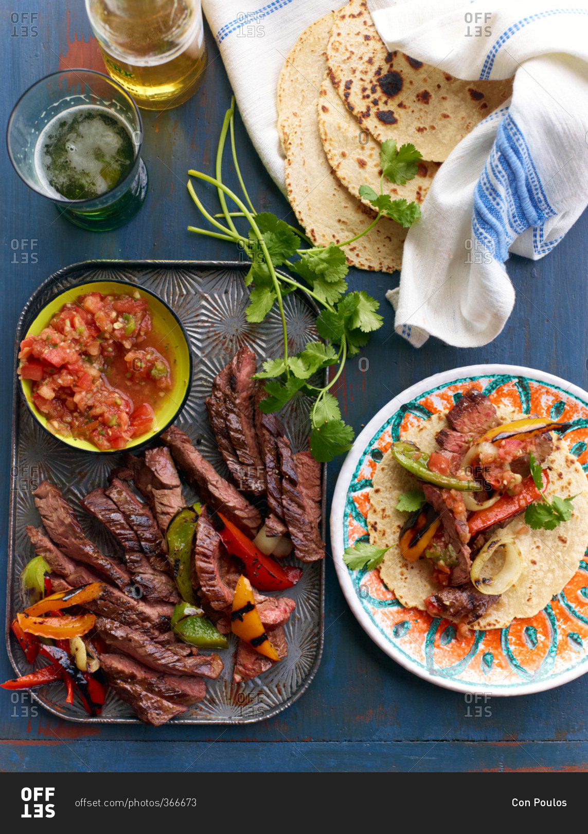 Steak fajita and ingredients on a table stock photo OFFSET