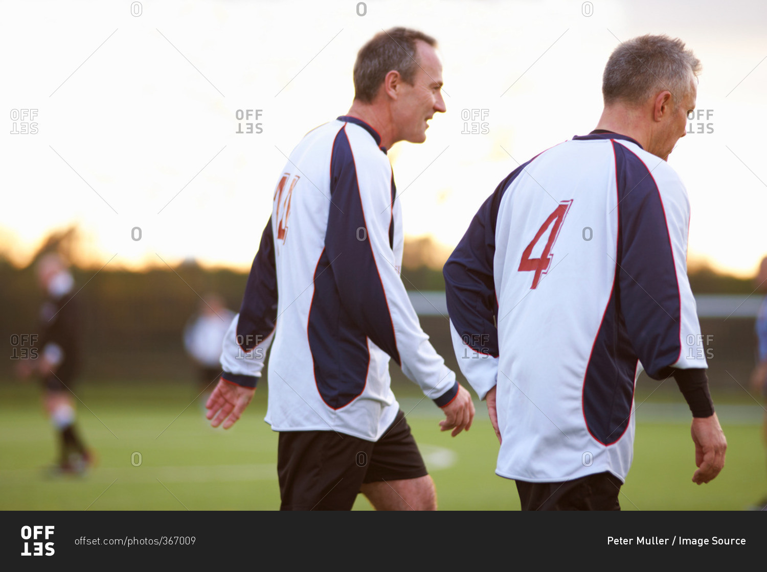 Soccer players at stop in game