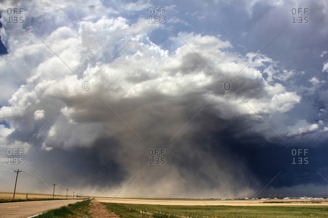 A massive supercell sucks up dust into the updraft leading to a violent dust storm, Sheridan Lake, Colorado, USA