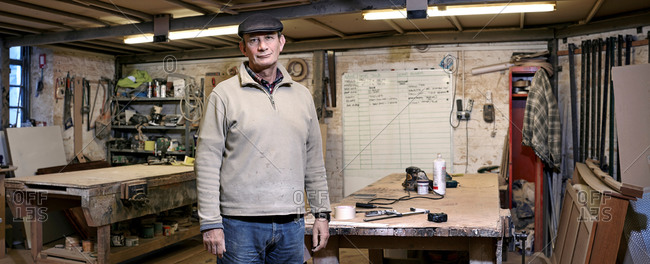 Portrait of a cabinet maker in his working environment