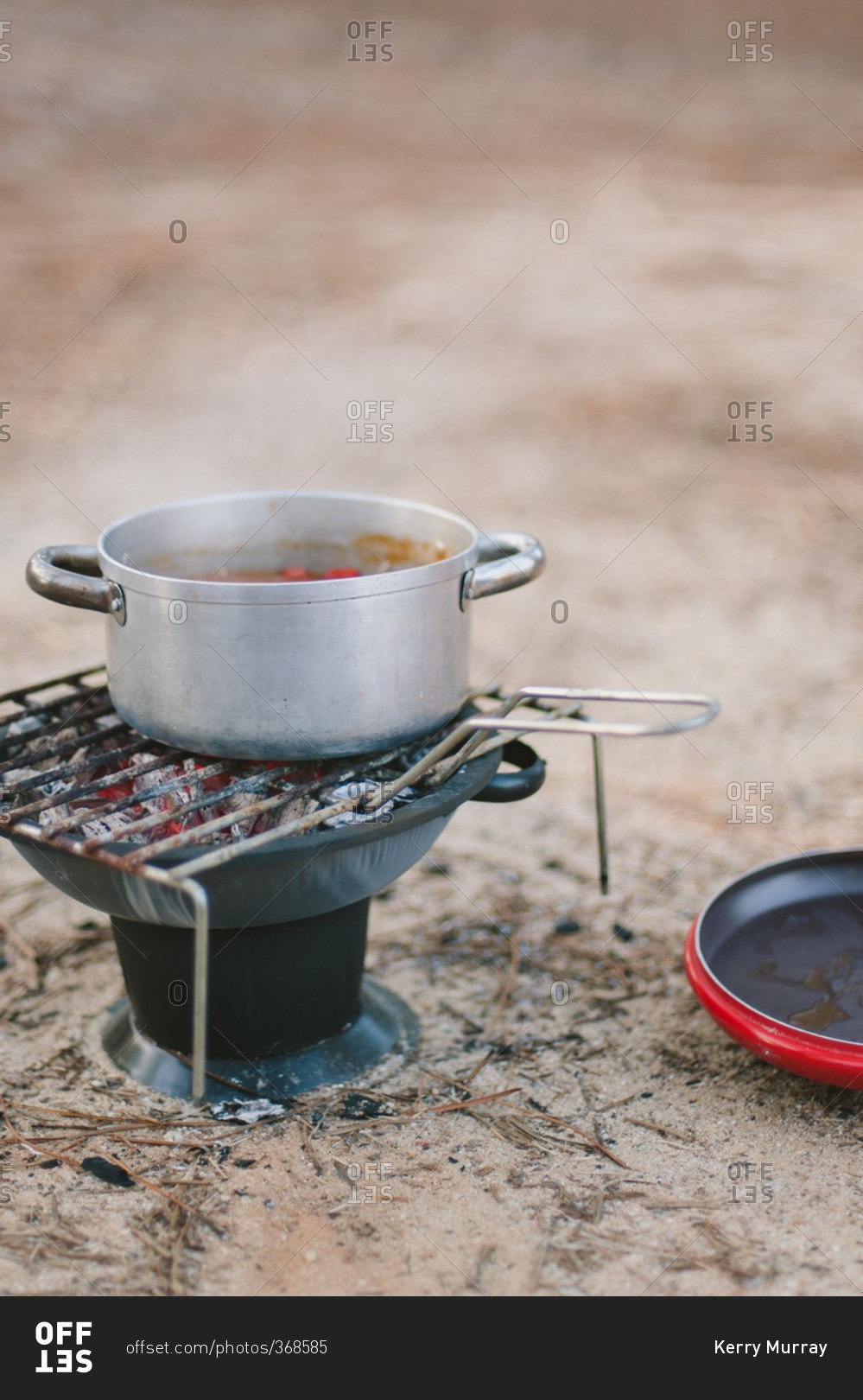 Pot cooking on camp stove
