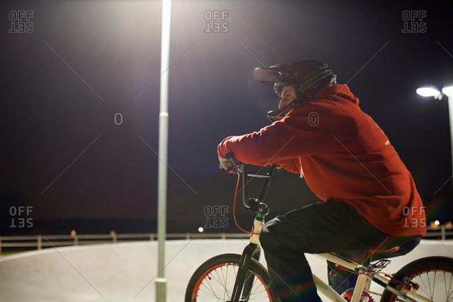 BMX-cyclist riding at night time