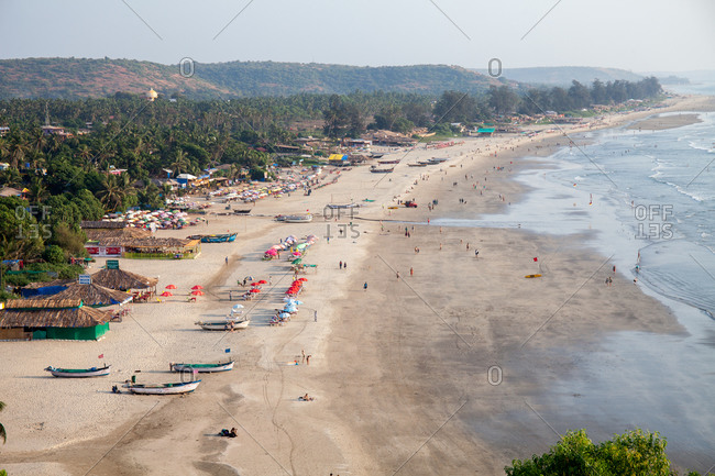 View of a resort area on an expanse of sandy beach