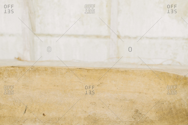 Detail of a weathered white wall