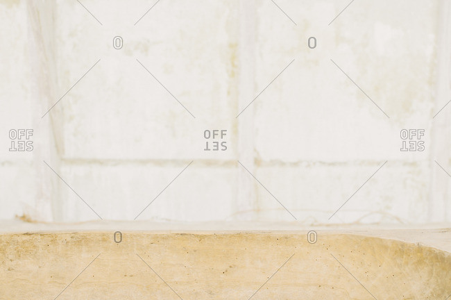 Detail of a weathered white wall