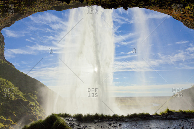 View from the footpath behind Seljalandsfoss Waterfall in evening