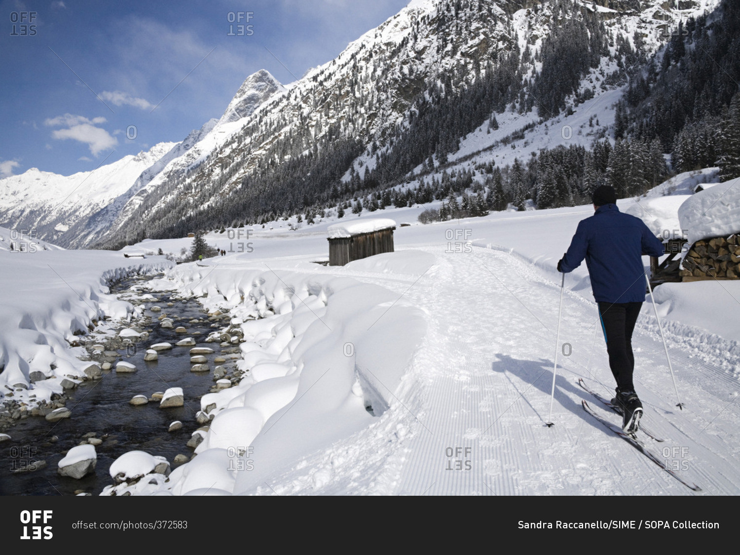 Walking and cross country ski track along the river Pitze near Weisswald