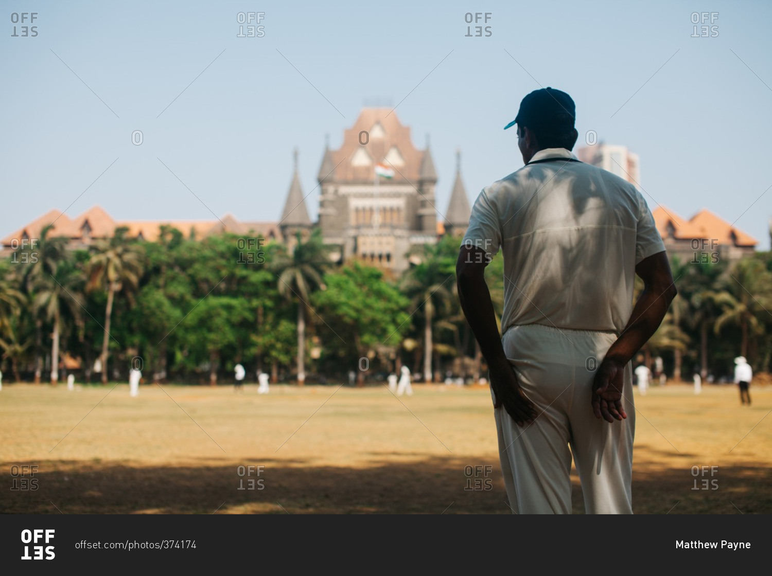Man watching cricket match, Mumbai