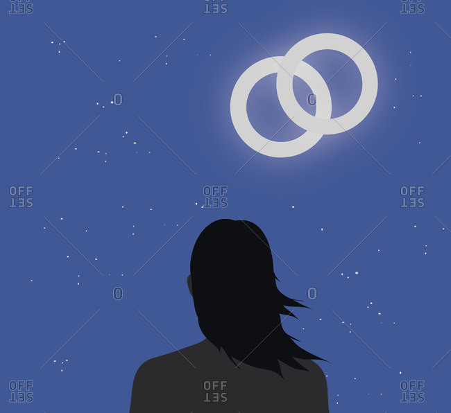 Person looking at night sky with overlapping circles