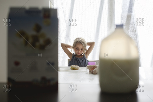 Girl eating breakfast - Offset Collection