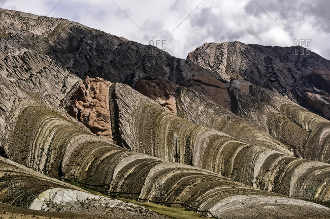 Layers of sedimentery rock visible in the undulating hills at Quebrada de Humahuaca, Argentina