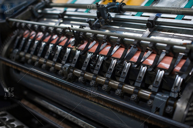 Close up of paper print machine in printing workshop