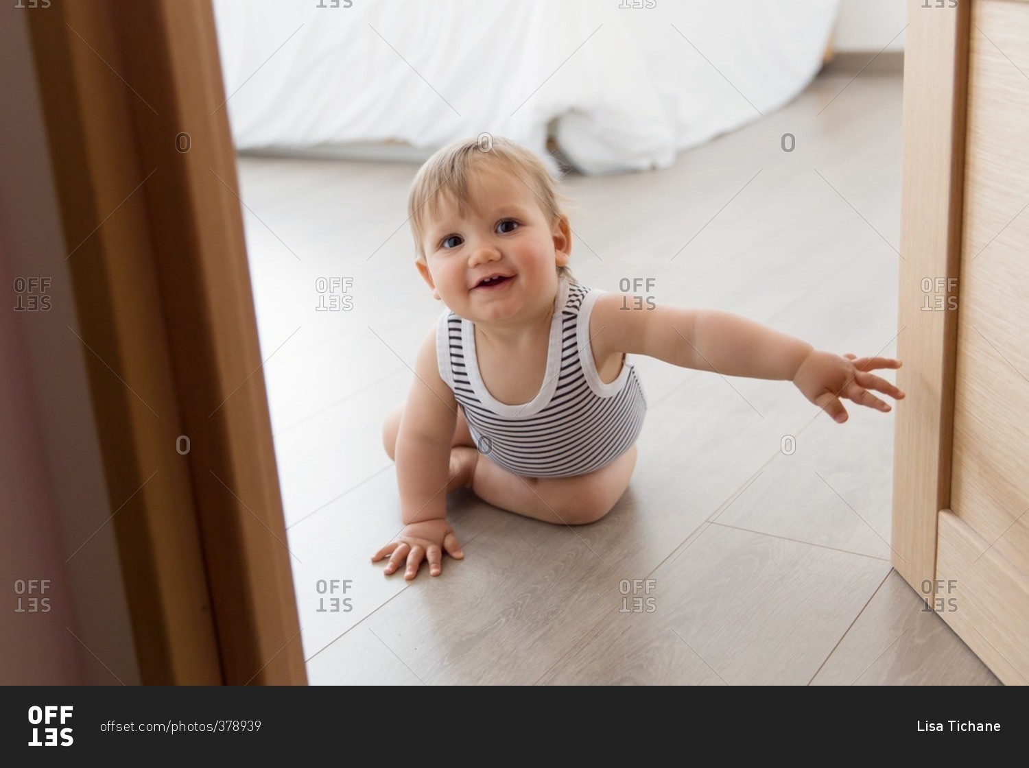 Baby opening door Offset Collection stock photo OFFSET