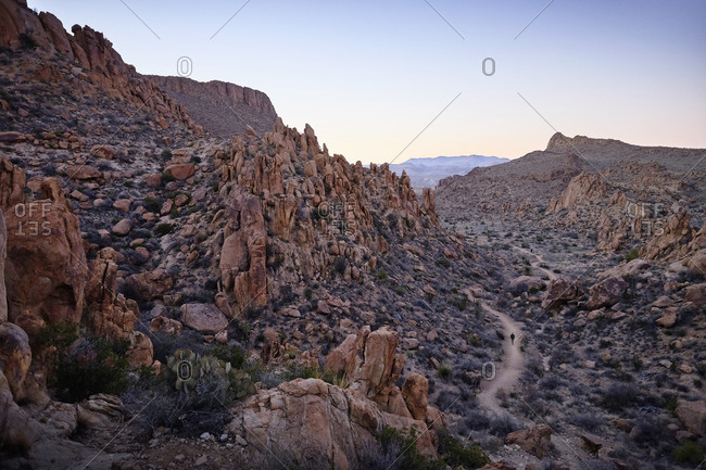 Hiker on remote rocky path