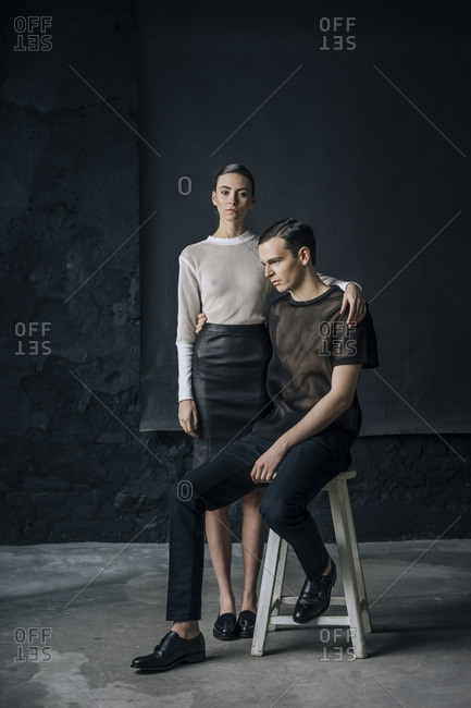 beautiful sensual couple in elegant clothes posing in studio Stock Photo |  Adobe Stock