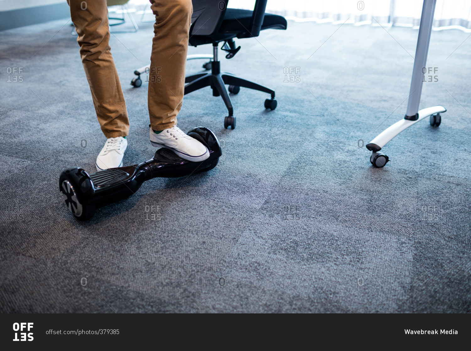Man using a smart balance wheel stock photo OFFSET