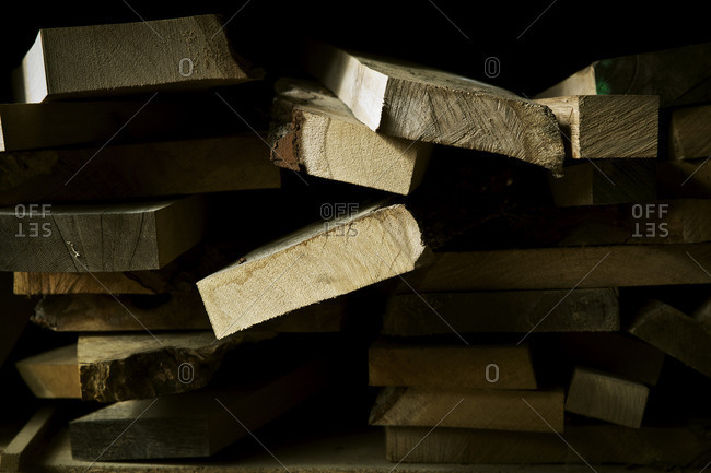 Sawn pieces of wood, offcuts, in a wood workshop
