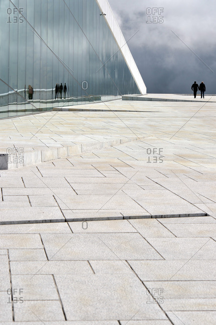 Oslo, Norway - April 30, 2015: Walking through the roof of Oslo's Opera House, Norway