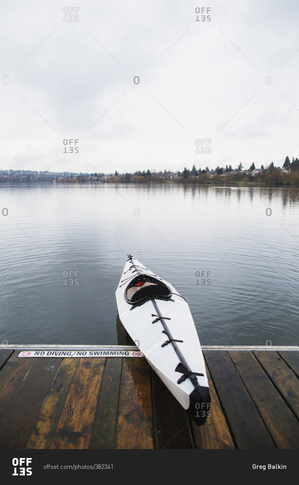 Kayak on a lake shore