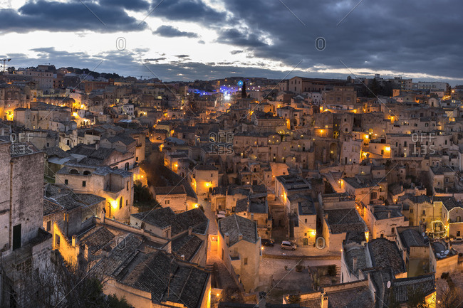 Overview of Sassi di Matera at dusk, one of the three oldest cities in the world, Basilicata, Italy