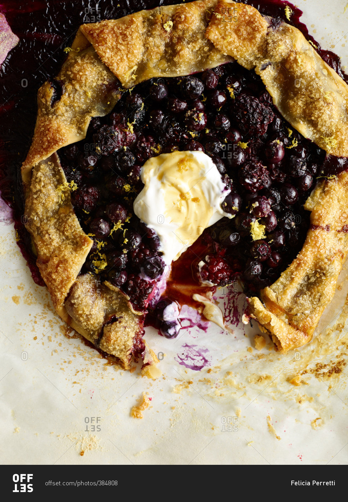 Mixed berry galette with whipped cream