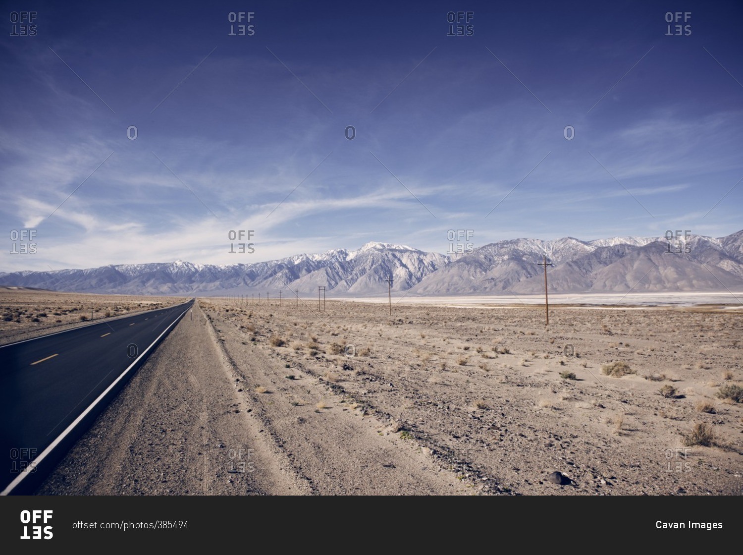 Scenic view of Death Valley National Park against blue sky