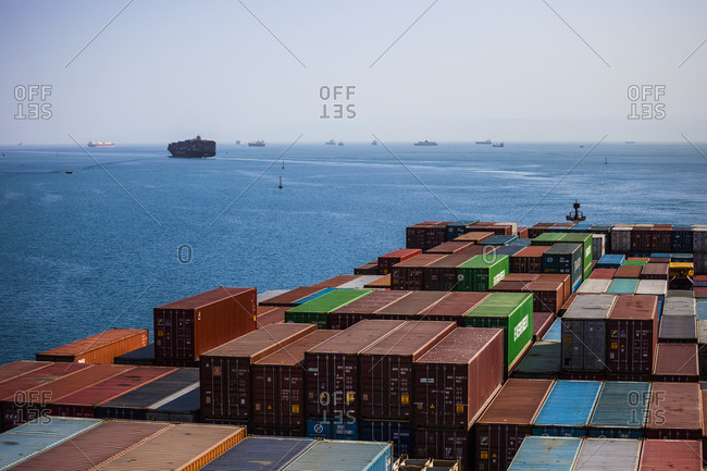 Suez, Egypt - April 8, 2014: Container ship on the southern end of the Suez Canal, Egypt
