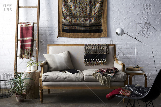 Living room interior with several hand woven blankets