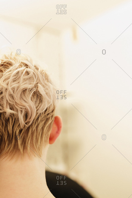 Back View Of A Woman With Short Wavy Blonde Hair Stock Photo Offset
