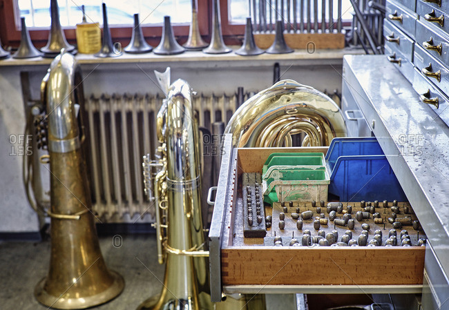Workshop of an instrument maker with brass instruments