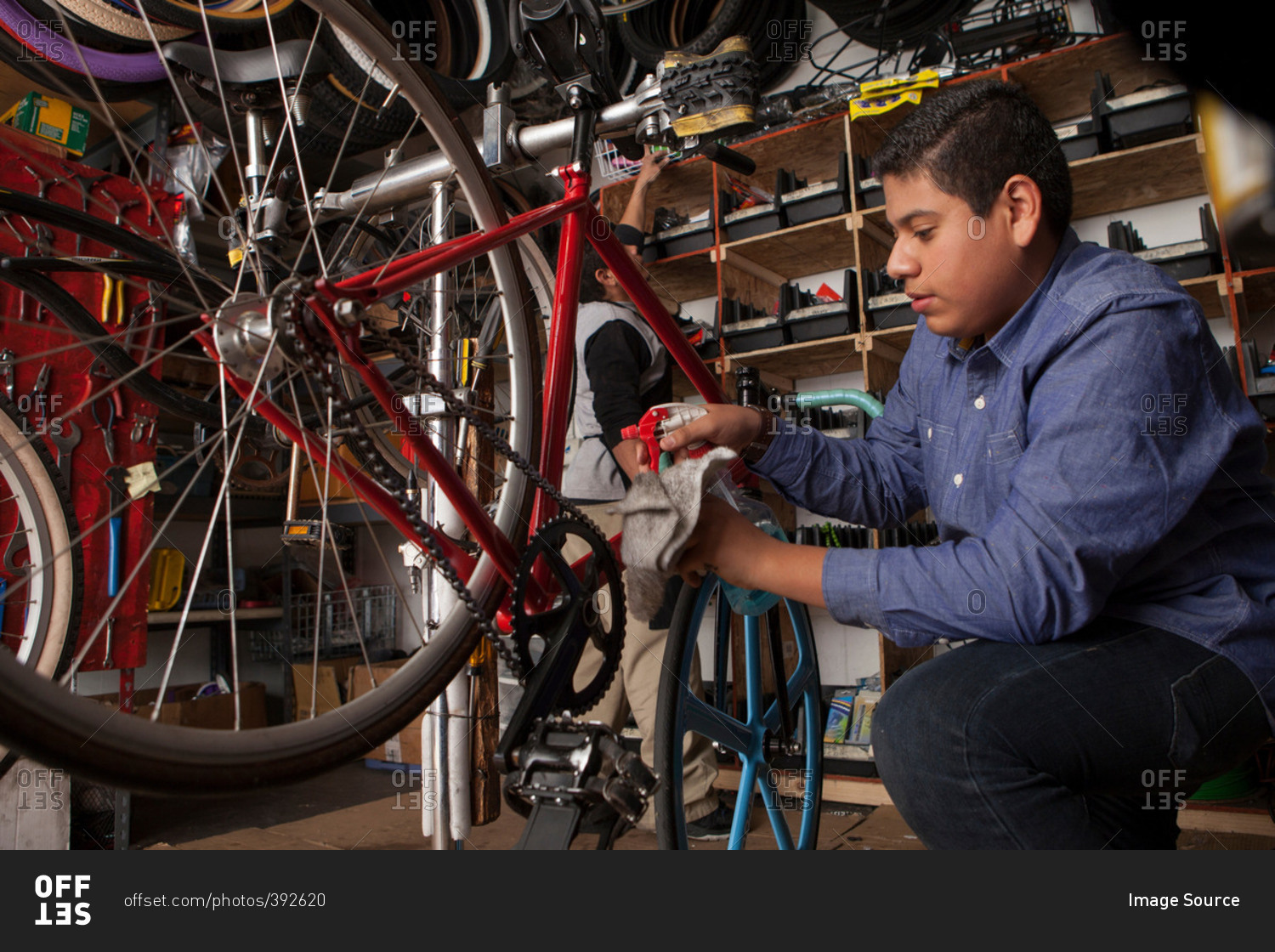 Profile of a mechanic working in bicycle shop