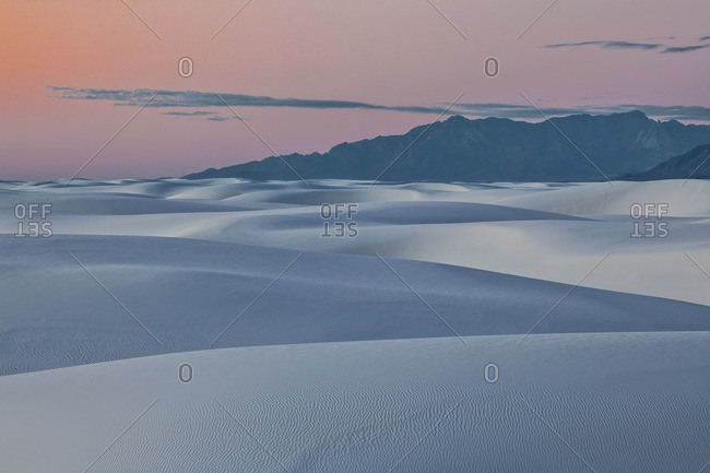 Sunset afterglow and twilight dunes in White Sands National Monument