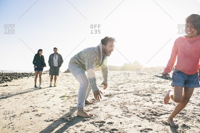 Family having fun on beach