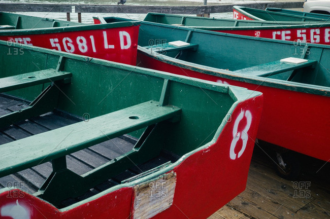 7/1/16: A group of colorfully painted boats grouped together along a wood dock