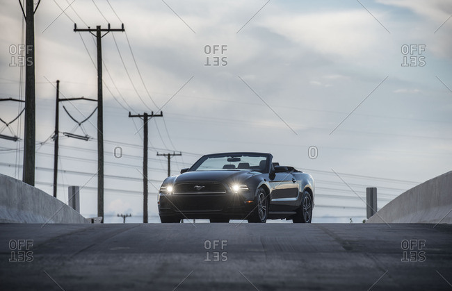 MIAMI, USA - JULY 12, 2016: Ford Mustang Convertible GT 2014 (fifth generation) version at Miami countryside roads, USA