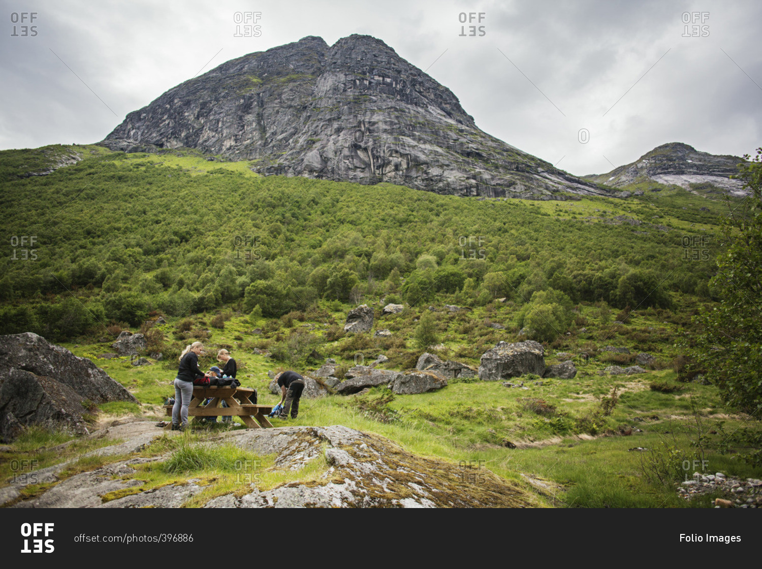Norway, Glomsdalen, Two women with two girls hiking in mountains