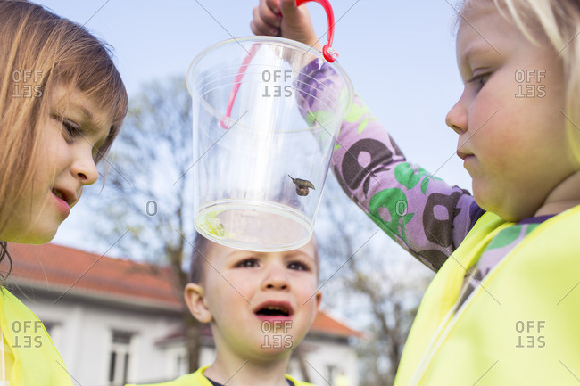 Sweden, Vastergotland, Olofstorp, Bergum, Kindergarten children learning outdoors