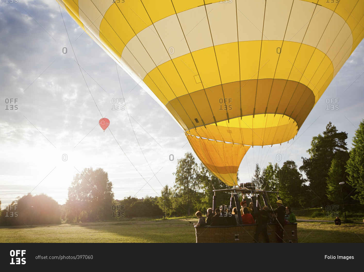 Sweden, Sodermanland, Stockholm, Arsta, Group of people in hot air balloon