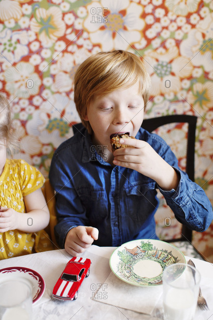 Sweden, Boy and girl eating cake