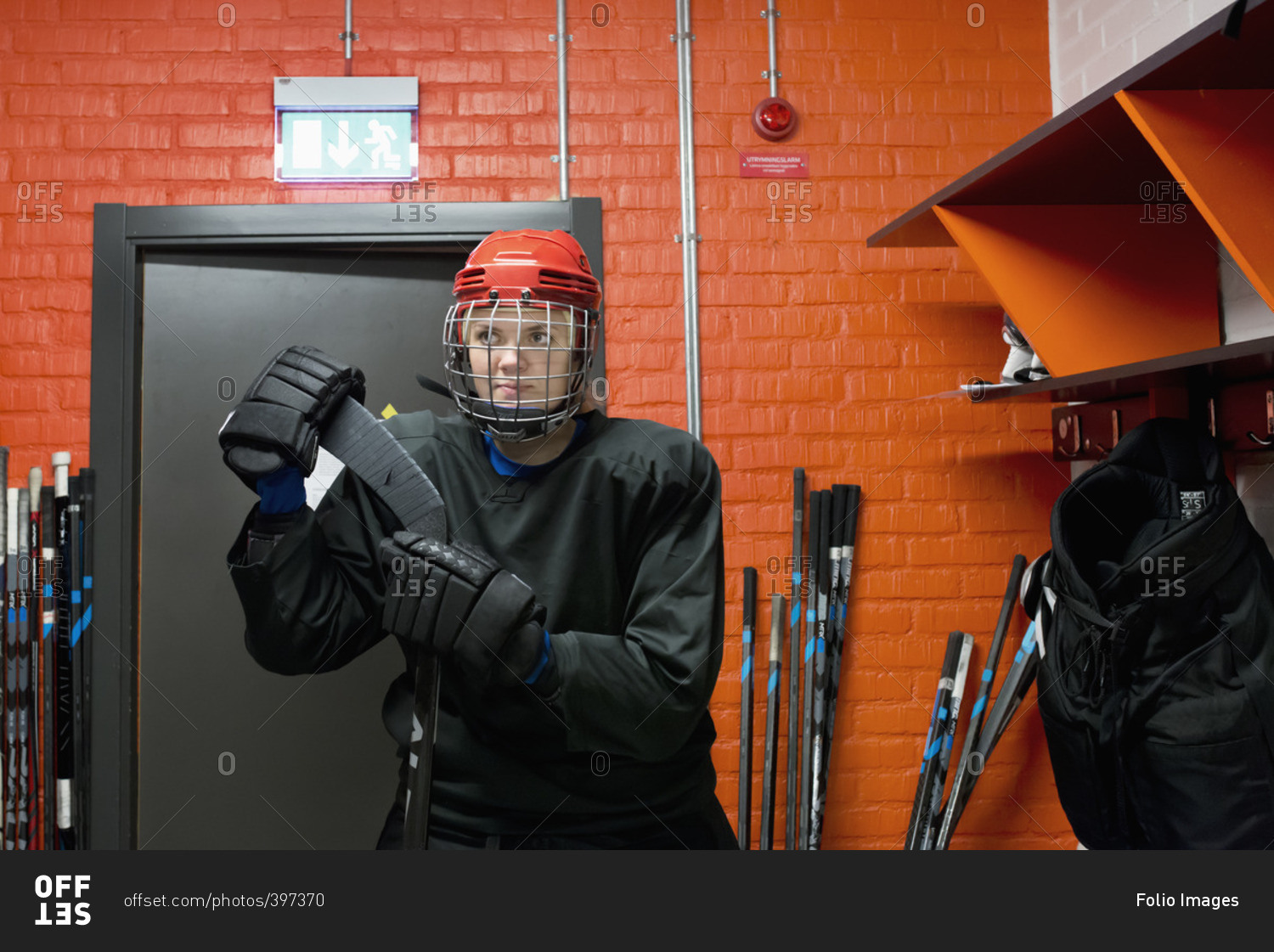 Sweden, Dressed hockey player in locker room