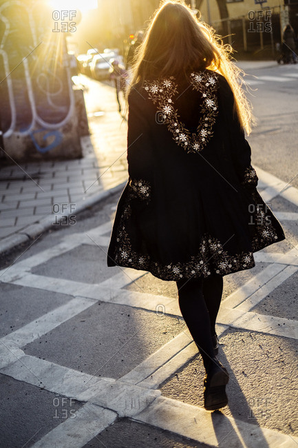 Sweden, Stockholm, Sodermalm, Rear view of walking woman