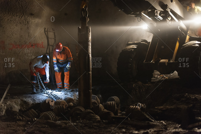 Sweden, Norrbotten, Kiruna, Miners working underground