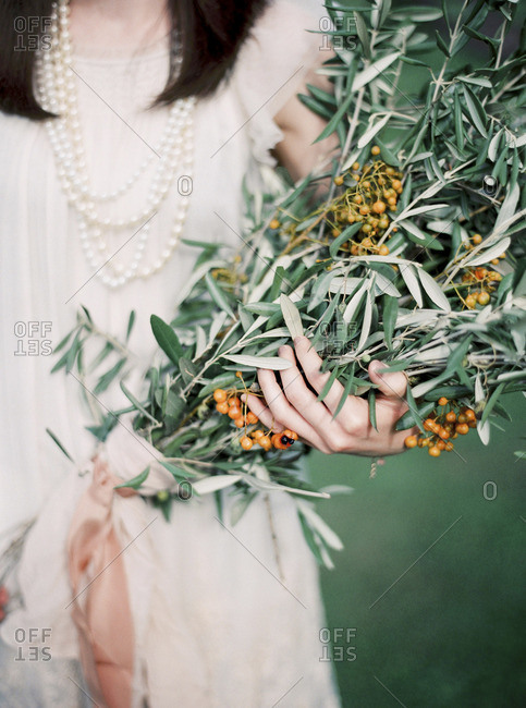 Italy, Elegant woman holding bouquet