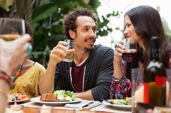 Friends enjoying dinner together