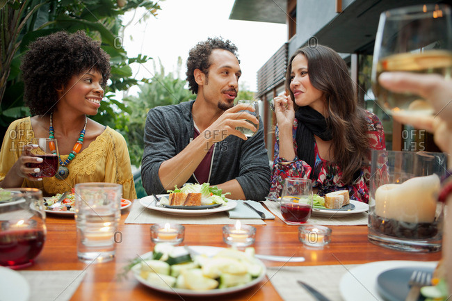 Friends enjoying meal together