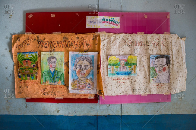 Thailand - January 27 2015: Drawings of Thailand's king hang in a primary school in northern Thailand