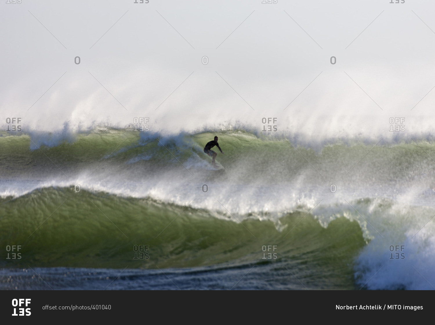 Man surfing on the wave in sea, Samara, Costa Rica