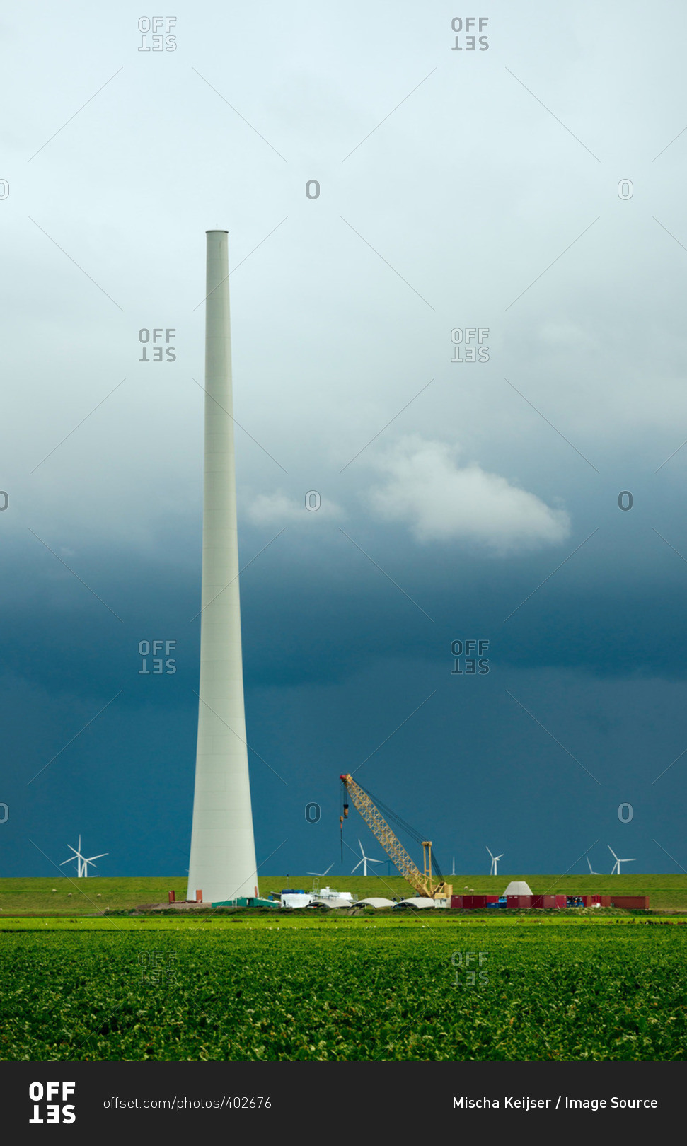 Thunderstorm approaching a wind turbine under construction, Netherlands