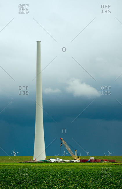 Thunderstorm approaching a wind turbine under construction, Netherlands